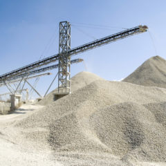 Working belt conveyors and a piles of rubble in Gravel Quarry, CR AdobeStock_122947485_isabela66