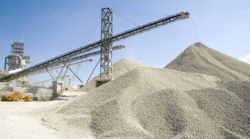 Working belt conveyors and a piles of rubble in Gravel Quarry, CR AdobeStock_122947485_isabela66